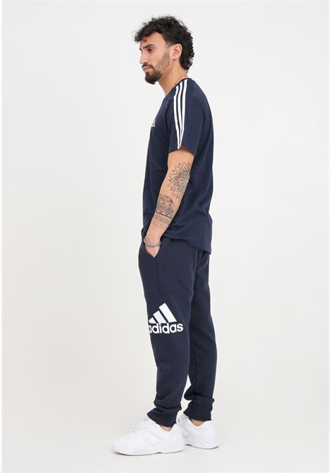 Essentials blue men's french terry tapered cuff logo trousers ADIDAS PERFORMANCE | HA4344.